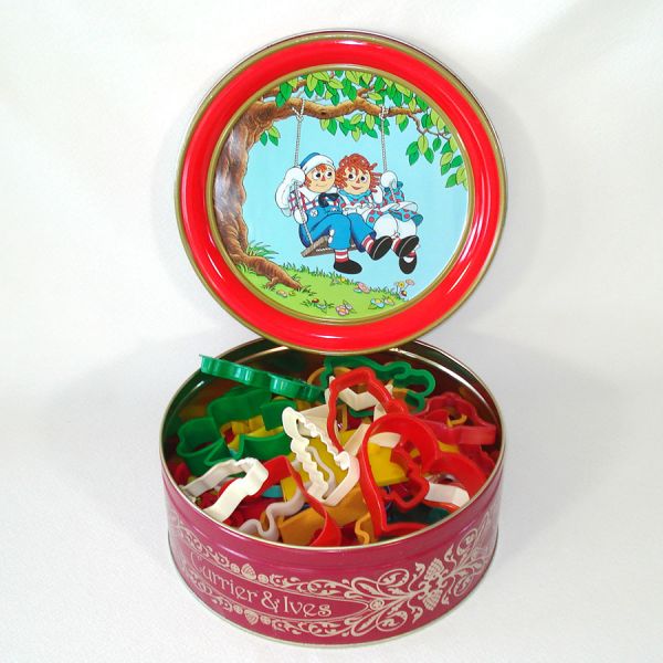 39 Plastic Cookie Cutters in Raggedy Ann Tin